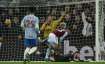 Aston Villa's Philippe Coutinho (centre) scores his side's second goal during the English Premier Le