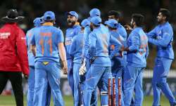 Virat Kohli of India celebrates after taking the wicket of
