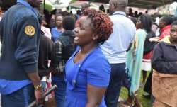 A woman reacts at the Kakamega Teaching and Referral
