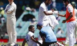 India's Hanuma Vihari receives treatment to a leg injury