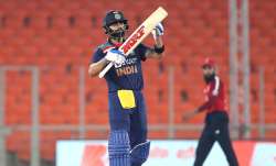 India Captain Virat Kohli celebrates after making 50 during