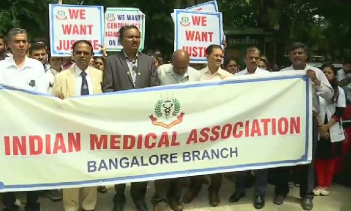 Doctors and nurses in state-run hospitals, who are IMA
